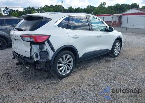 2021 Ford Escape Titanium z USA, uszkodzony, nr VIN 1FMCU9J98MUA79186